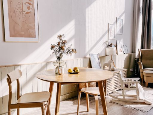 brown wooden table with chairs